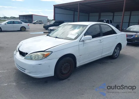2003 Toyota Camry Le from USA, damaged, VIN 4T1BE32K33U122340
